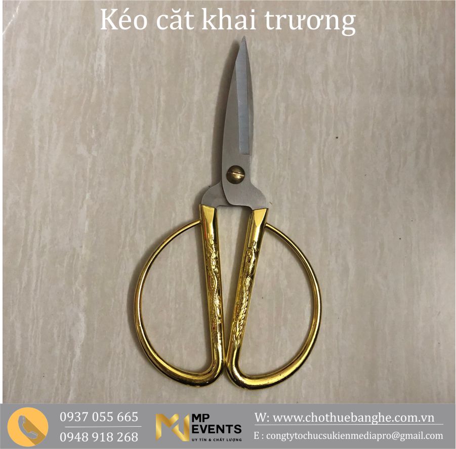 Kéo cắt băng khai trương